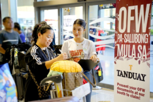 Tanduay Gives Homecoming Gifts to Returning OFWs at Cebu Airport
